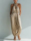 Chic Elegant Beige Linen Cross Halter-Neck Sleeveless Cutout Detail Elastic-Waist Loose-Fit Cuffed Jumpsuit