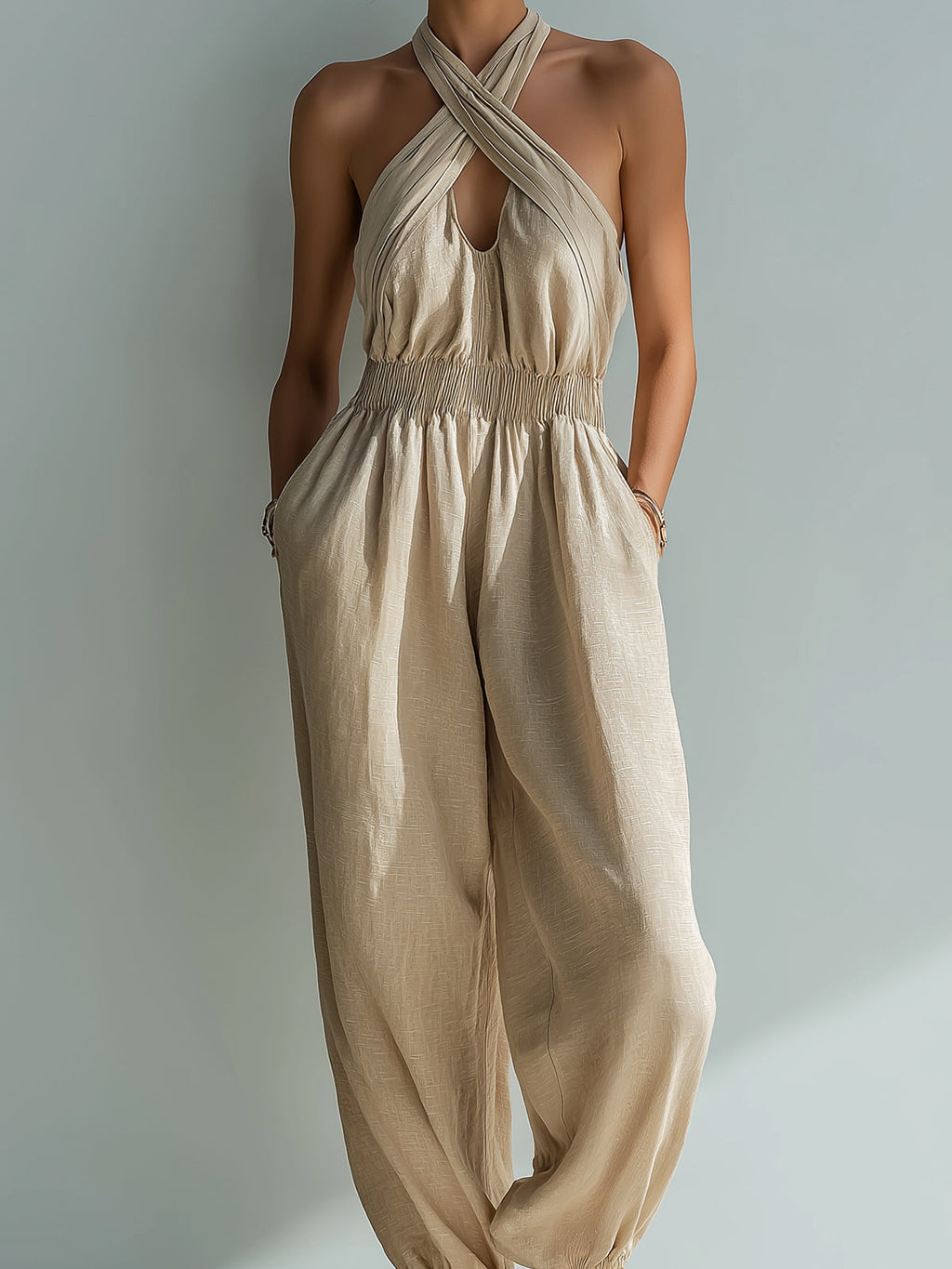 Chic Elegant Beige Linen Cross Halter-Neck Sleeveless Cutout Detail Elastic-Waist Loose-Fit Cuffed Jumpsuit