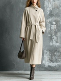 Chic Casual Oat Beige Stand Collar Raglan‑Sleeve Button-Up Detail Tie Belt Loose-Fit Cotton Twill Wrap Coat