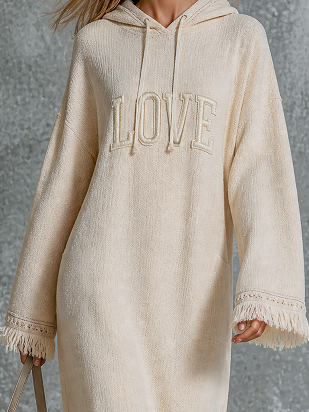 Chic Casual Off‑White Hooded Letter Embroidery Drop‑Shoulder Long-Sleeve Loose-Fit Fringe Trim Textured Knit Maxi Dress