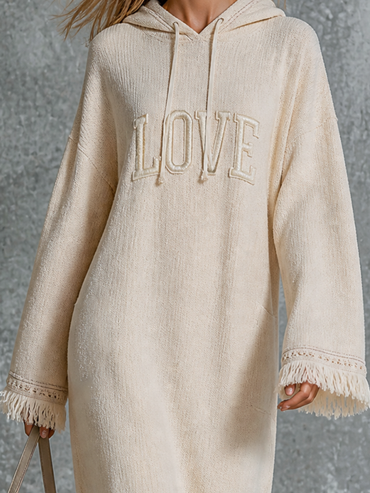 Chic Casual Off‑White Hooded Letter Embroidery Drop‑Shoulder Long-Sleeve Loose-Fit Fringe Trim Textured Knit Maxi Dress