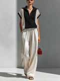 Chic Elegant Black-Beige Colorblock Zipper-Up Lapel Collar Short-Sleeve Knit Sweater Top Beige Satin Wide-Let Pants Two-Piece Set